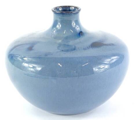 An Ashby Guild pottery vase, decorated with a blue flambe type glaze, 13cm high, impressed mark to underside.