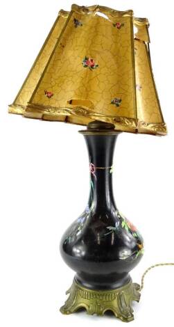 A Paris porcelain lamp base, painted with flowers, on a black ground, with gilt metal mounts and paper and gesso shade, shade AF, 58cm high.