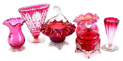 Various items of Victorian and later cranberry tinted glass, to include a posy vase, jug, jar and cover, etc.