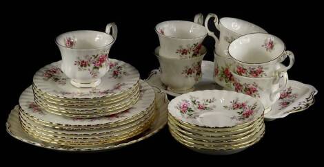 A Royal Albert Lavender Rose pattern part tea service, to include seven cups, various saucers, plates, tea plates, cake plate, etc., some seconds.