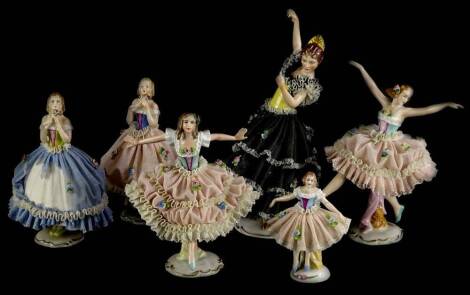 A collection of six continental porcelain crinoline ladies, to include a Spanish dancer with black dress (AF), the largest 19cm high.