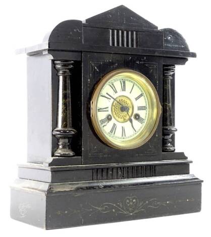 A German ebonised mantel clock, labelled for Junghans, with cross arrows, etc., 37cm H.