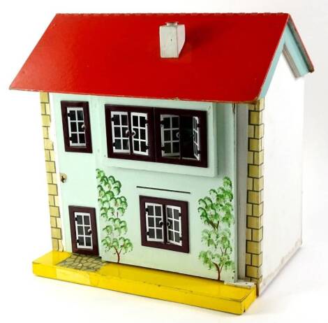 A small child's painted dolls house, with tin plate door and windows, and a small amount of dolls house furniture, 36cm wide.