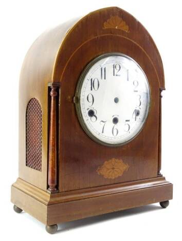 A late 19thC/early 20thC mahogany and marquetry clock case, the white enamel dial with Roman numerals, lacking movement, 39cm high.