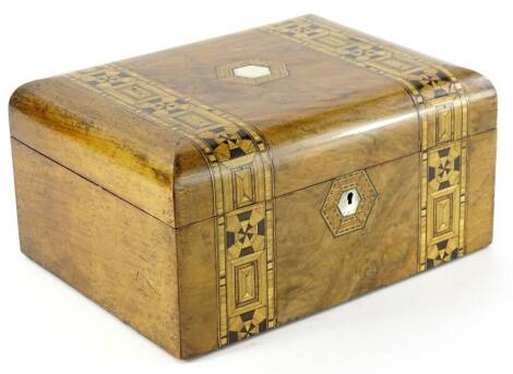 A Victorian walnut and parquetry workbox, the domed hinged lid with a vacant ivorine cartouche, enclosing a vacant interior, 29cm wide.