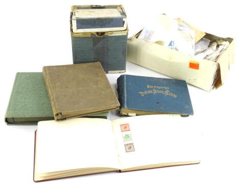 A large quantity of franked foreign stamps, some in albums etc.