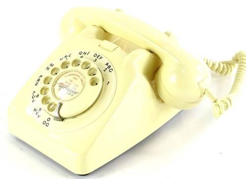 A 1966 GPO 706 ivory coloured telephone, in unissued condition, bell on/off switch fitted.