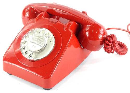 A 1960's GPO 706 red telephone, in unissued condition, refurbished by BT 1982, bell on/off switch fitted.