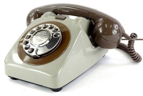 An unusual type 706 grey telephone, with chrome dial, bell on/off switch.