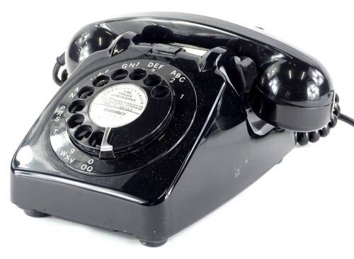 A 1960 GPO 706 black telephone, with bell on/off switch, original junction box with BT plug.