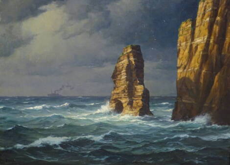 Paul Wolde (1885-1948). Rocky coastal scene, oleograph, signed, 59cm x 79cm.