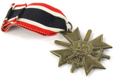 A German 1939 war merit medal, with ribbon.