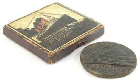 A Lusitania medal, in original box, and with fly sheet stating a German Naval Victory.