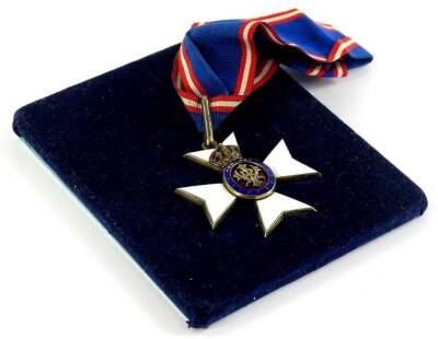 A Commander of the Royal Victorian order, in white, blue and red enamel, with ribbon, engraved to the reverse C445.