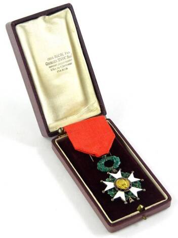 A Legion D'Honneur, in white and green enamel, with ribbon and original case.