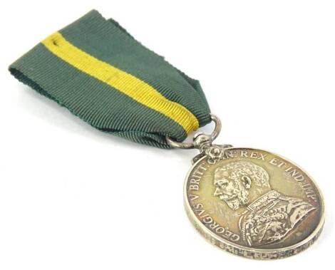 A George V Territorial Force Efficiency medal, awarded to a 514189 Sapper Lance Corporal E.A. Medland, Royal Engineers.