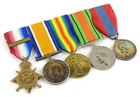 A group of First and Second World War medals, awarded to a 5332 Private A. Lovett, of the 1st Rifle Brigade, the 1914 Star, with the bar for the 5th August - 22nd November 1914, the 1914-18 Campaign medal, the Victory medal, the Second World War Defence m