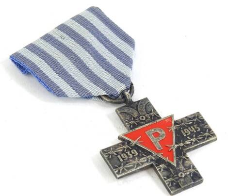 An Auschwitz Cross Holocaust medal, dated 1939-45 with P in red enamel, striped blue ribbon.