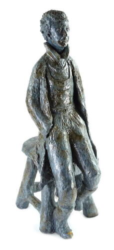 20thC French School. Studio pottery sculpture of a gentleman seated on a stool with loose head section, 68cm H overall.