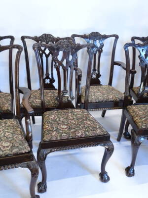 An early 20thC mahogany extending dining table, the oval top with a moulded edge with a gadrooned frieze on cabriole legs with ball and claw feet, two loose leaves, 72cm high, the top, 120cm x 204cm, and a set of eight Chippendale style dining chairs. - 2