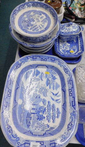 Various blue and white wares, to include willow pattern meat plates, dinner plates etc. (1 tray and loose).