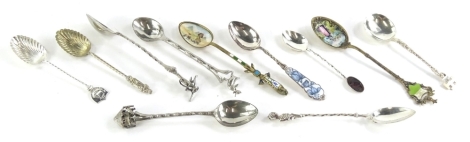 A collection of silver, white metal and silver plated souvenir spoons, to include the Philippines, France, etc.