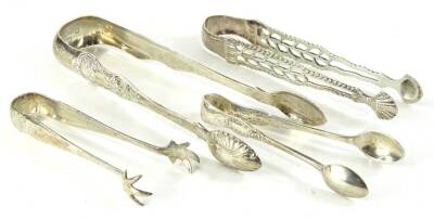 A collection of 19thC and later sugar tongs, to include an example with pierced and engraved sides etc., 1½oz.