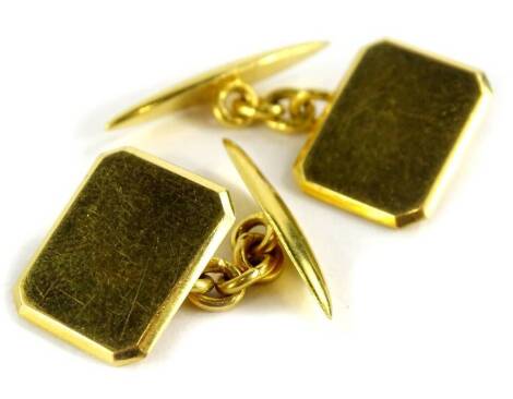 A pair of cufflinks, each with rectangular cut front, and diamond set back, yellow metal with various Chinese/ Asian markings, 14g all in.