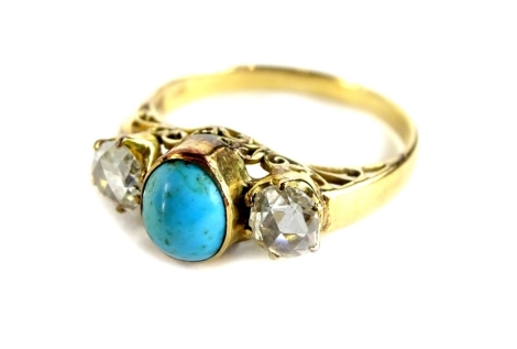 An 18ct gold turquoise and diamond set elaborate dress ring, the small oval turquoise stone in rubover setting, with old cut diamonds to each side, 5mm x 1.2mm, in claw setting, the head in scroll carved surround, on a plain band, ring size T½, 4.6g all 