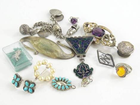 Various miscellaneous silver and other jewellery, comprising a pair of topaz clip-on earrings, an imitation amber dress ring, a silver collar stud, an Eastern silver enamel brooch medallion, a silver plated fish pendant, a silver gilt and purple paste sto