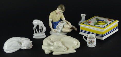 A collection of ceramics, Royal Doulton figure Treasure Island, a Wedgwood cream glazed calf, Continental cat, Rosenthal deer, Royal Copenhagen miniature vase, Wedgwood miniature tankard and Quimper lozenge shaped box (7).