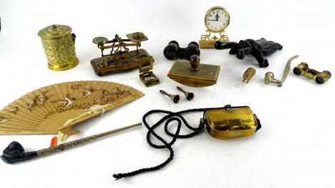 A collection of metalware etc., to include a pressed brass string box, a set of oak and brass postal scales, two pairs of opera glasses, a cast iron insect shaped boot jack, two Eastern pipes, pierced van decorated with oriental cranes, desk blotter, smal