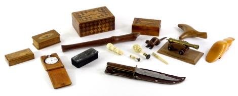 A collection of treen and wooden items etc., to include a parquetry box, carved wooden stamp box, carved platypus and similar otter, a brass and hardwood cannon, bone seals, Black Forest type watch stand with silver plated pocket watch, papier mache snuff