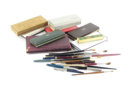 A collection of fountain and ballpoint pens, to include Parker, Scheaffer, etc., to include a set of drawing instruments.