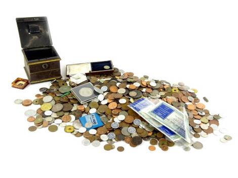 A large quantity of British and foreign coins, to include some silver, some early coins, etc.