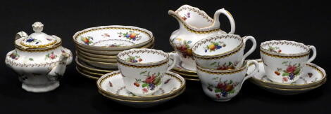 A Copeland Spode Rockingham pattern part tea service, each piece decorated with fruit, butterflies, etc., to include four cups, saucers, small teapot and cover etc.