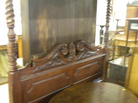 A Continental hardwood four poster bed in George III style with