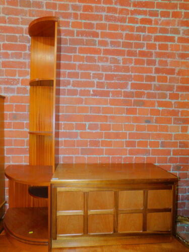 A Nathan teak television stand, 52cm high, 91cm wide, 46cm deep., together with a similar teak corner unit, 173cm high. (2)