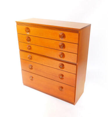 A Meredew teak chest, of seven long graduated drawers, raised on a plinth base, 113cm high, 102cm wide, 40cm deep.