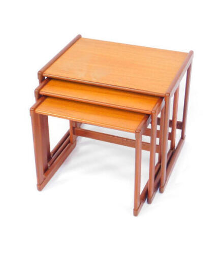 A G-Plan teak nest of occasional tables, largest 48cm high, 54cm wide, 43cm deep.