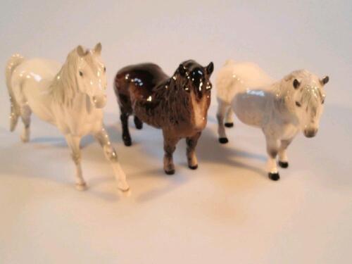 A Beswick Shetland pony "Honeydell Dixie" and a grey and woolley shetland no