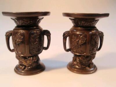 A pair of late 19thC Chinese bronze baluster two handled vases