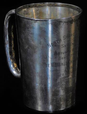 A George V silver mug, with tapering cylindrical body, C scroll handle, engraved Northshore Golf Club, Skegness, September 17th 1928, Birmingham 1928, 12cm high, 8oz.