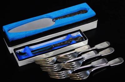 A silver handled cake slice, stainless steel and silver cheese knife, five various fiddle pattern forks, etc. (a quantity)