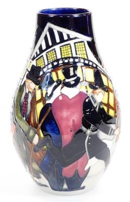 A Moorcroft pottery The Pickpockets vase, no.68/75 dated 2012, marks beneath, 25cm high. - 2