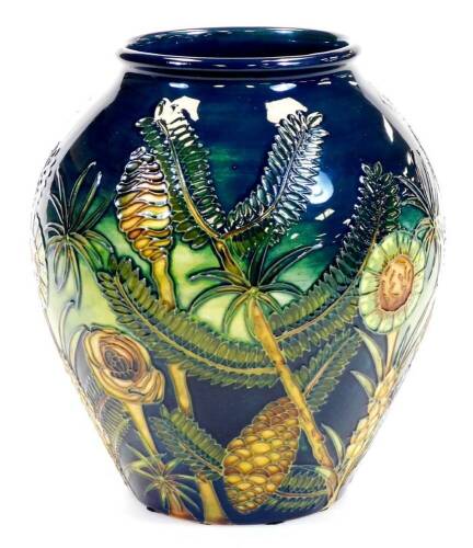 A Moorcroft pottery vase, decorated with fern, WM mark no. 229, 23cm high.(boxed)