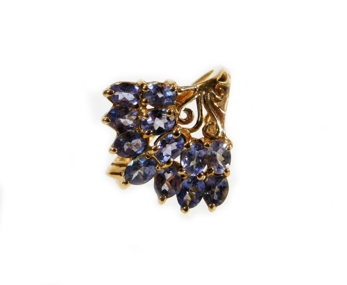 A modern dress ring, set with light blue/purple stones in a fan type decoration, on a yellow metal band, marked 10K, ring size M, 3.8g all in, boxed.