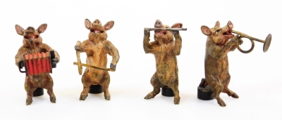 An early 20thC cold painted bronze pig band, of ten musicians by Franz Bergmann, Austrian, including conductor, cellist, drummer and flutist, in animated poses, the drummer with vase and B mark, the cellist stamped M H and Crown, each approx 4.5cm high. ( - 2