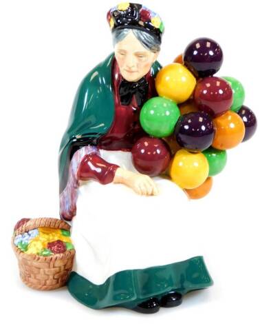 A Royal Doulton figure The Old Balloon Seller HN1315, printed marks beneath, 20cm high.