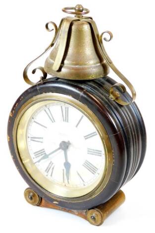 An early 20thC Wurttemberg mantel alarm clock, with elaborate bell and scroll top raised above a circular case with 13cm diameter Roman numeric dial, with repeat long alarm system, fixed keywind movement, 32cm high. (AF)